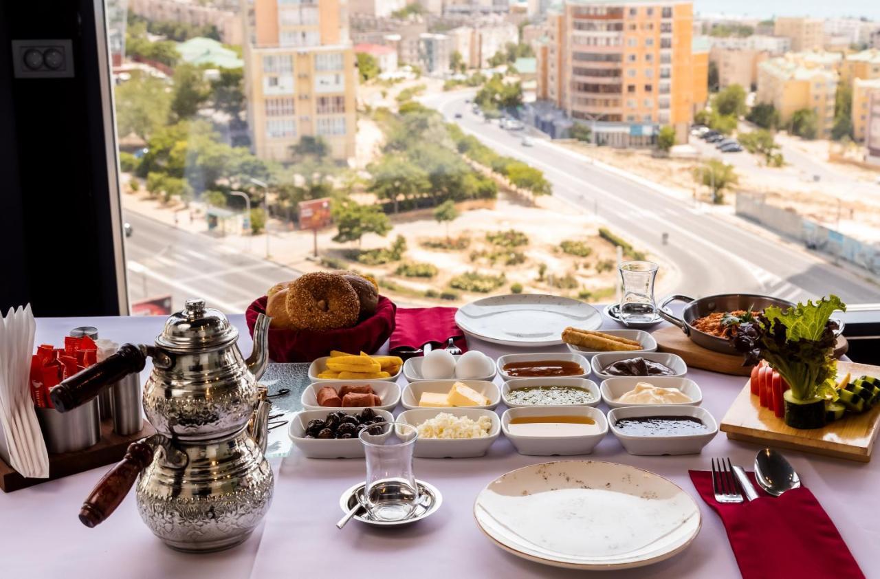 Grand Hotel Victory アクタウ エクステリア 写真 Israeli breakfast