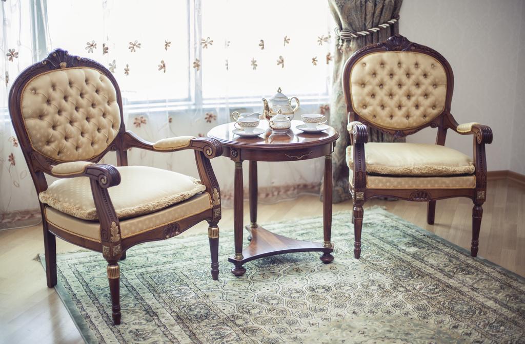 Grand Hotel Victory アクタウ エクステリア 写真 A carpet in a living room